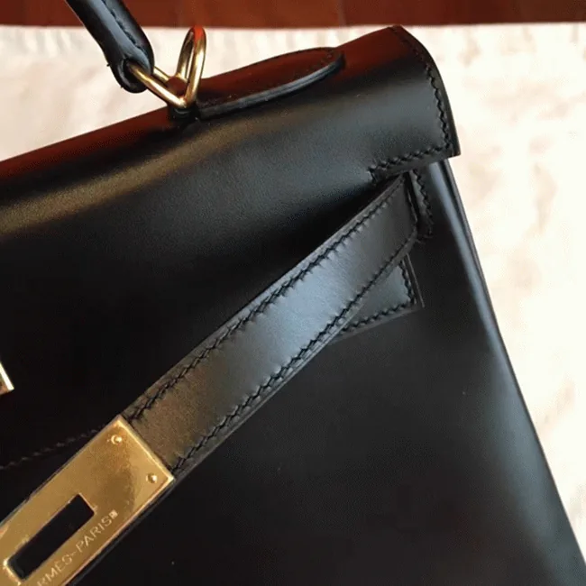 Reference image illustrating Replica Hermes Kelly Retourne 32cm Black Box Leather Handbag – Timeless Icon