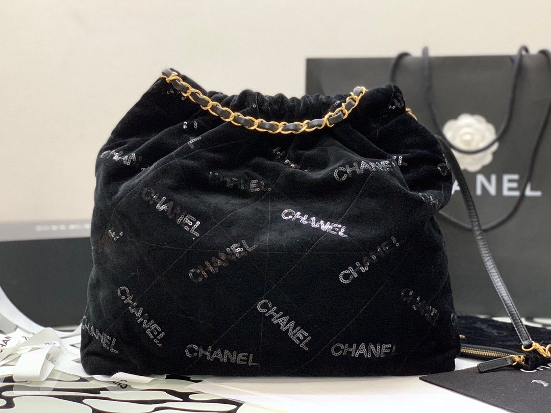 Reference image illustrating Replica CHANEL 22 Bucket Bag – Design, History & Style Guide