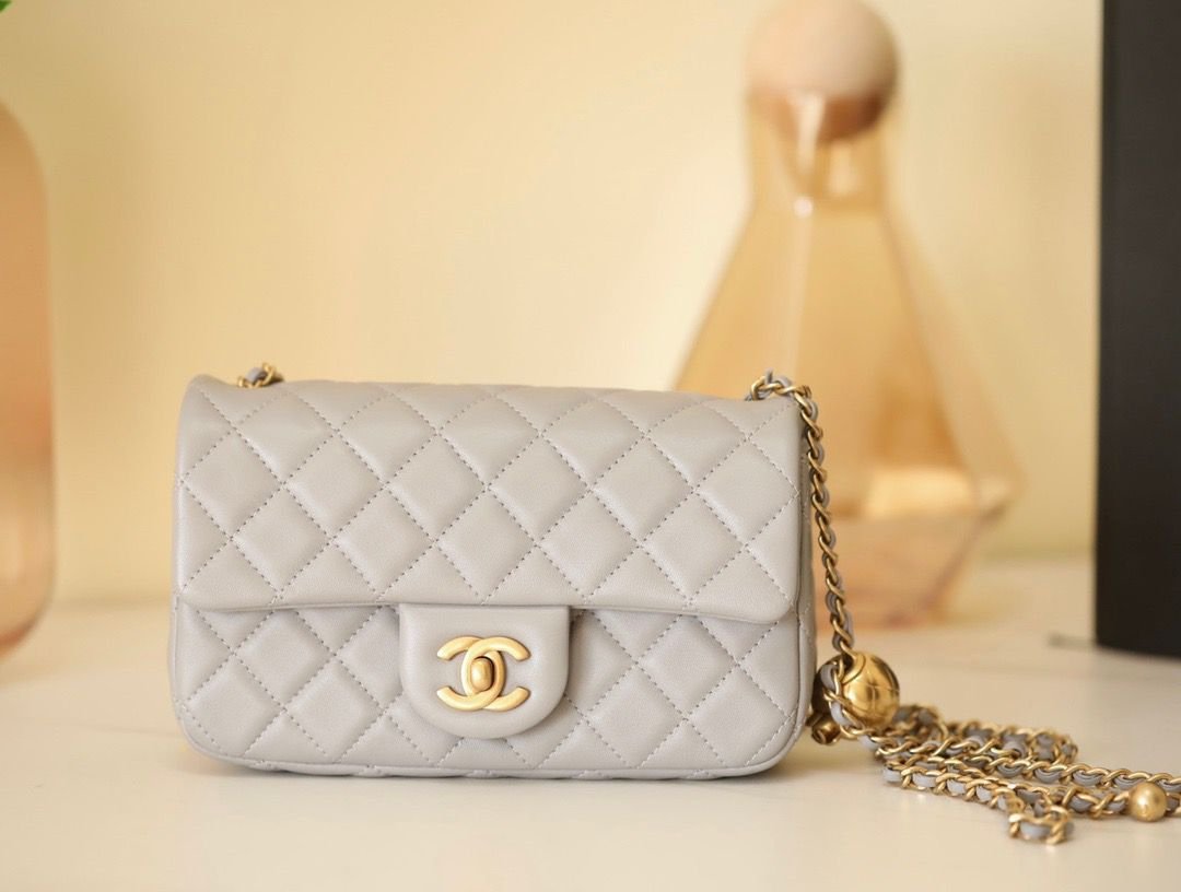 Replica Chanel Golden Ball Flap Bag in Grey – A Detailed Style Guide cover image