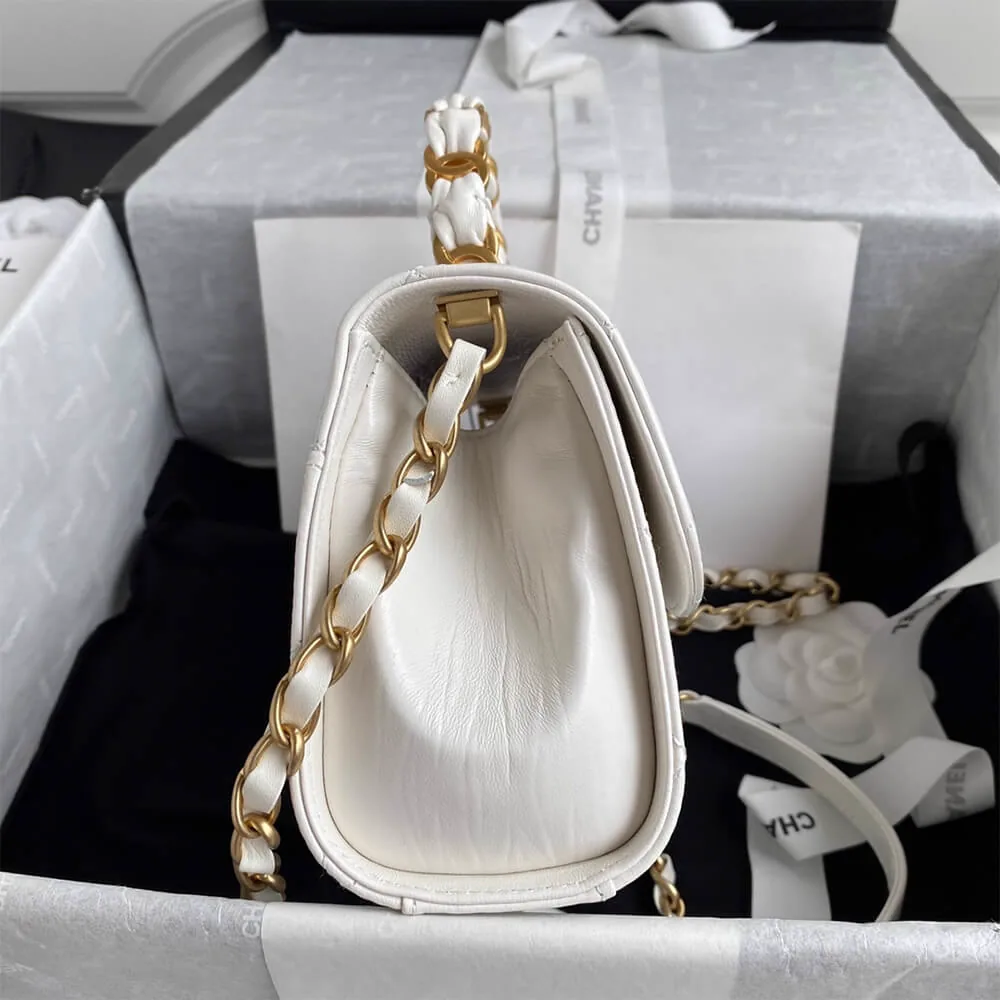 Reference image illustrating Replica CHANEL Mini Flap Bag with Top Handle – A Detailed Style Guide