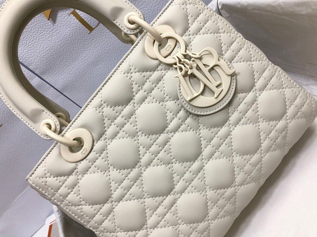 Reference image illustrating Replica Dior Lady Dior Medium Bag in White – Iconic Cannage Design