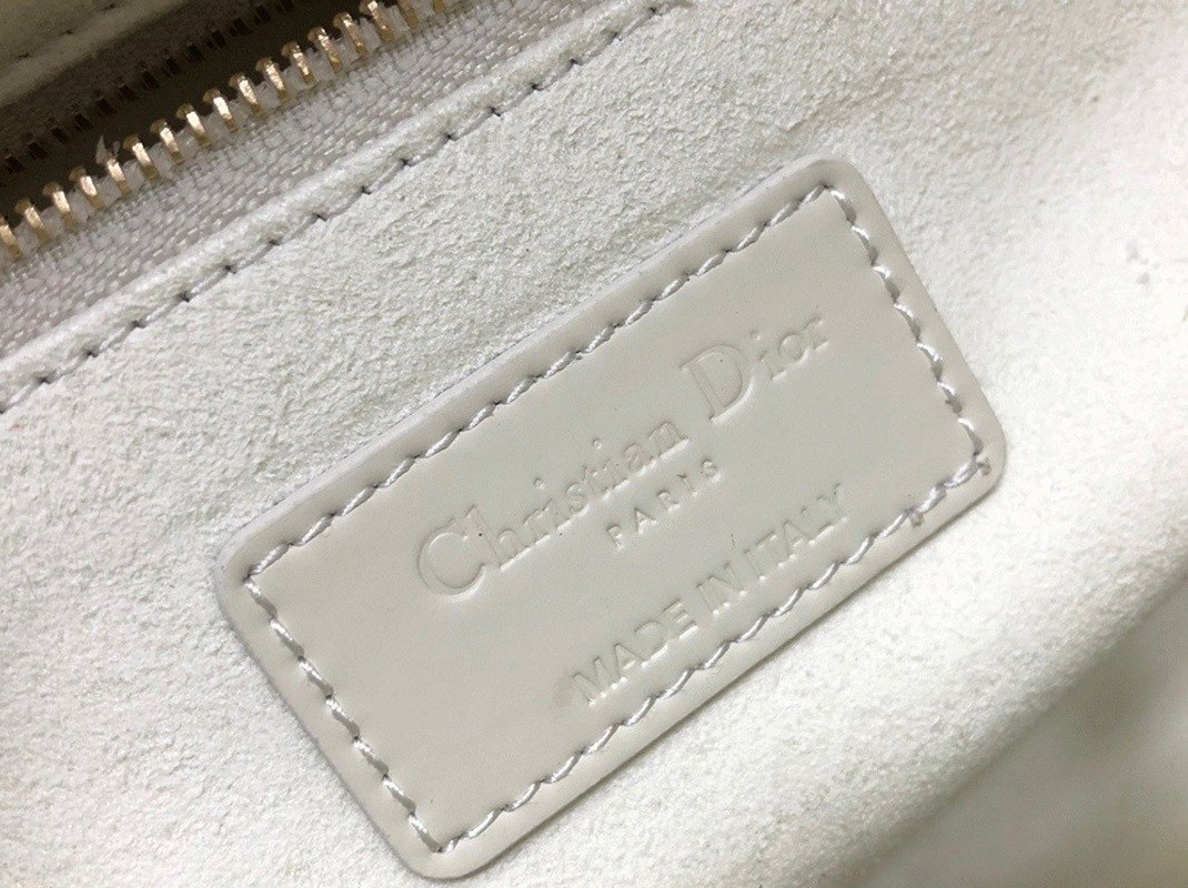 Reference image illustrating Replica Dior Lady Dior Medium Bag in White – Iconic Cannage Design
