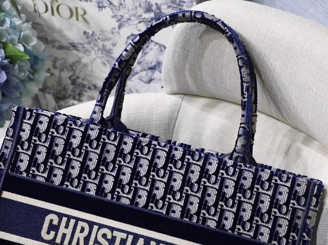 Reference image illustrating Replica Dior Medium Book Tote Bag in Blue Velvet Oblique Embroidered