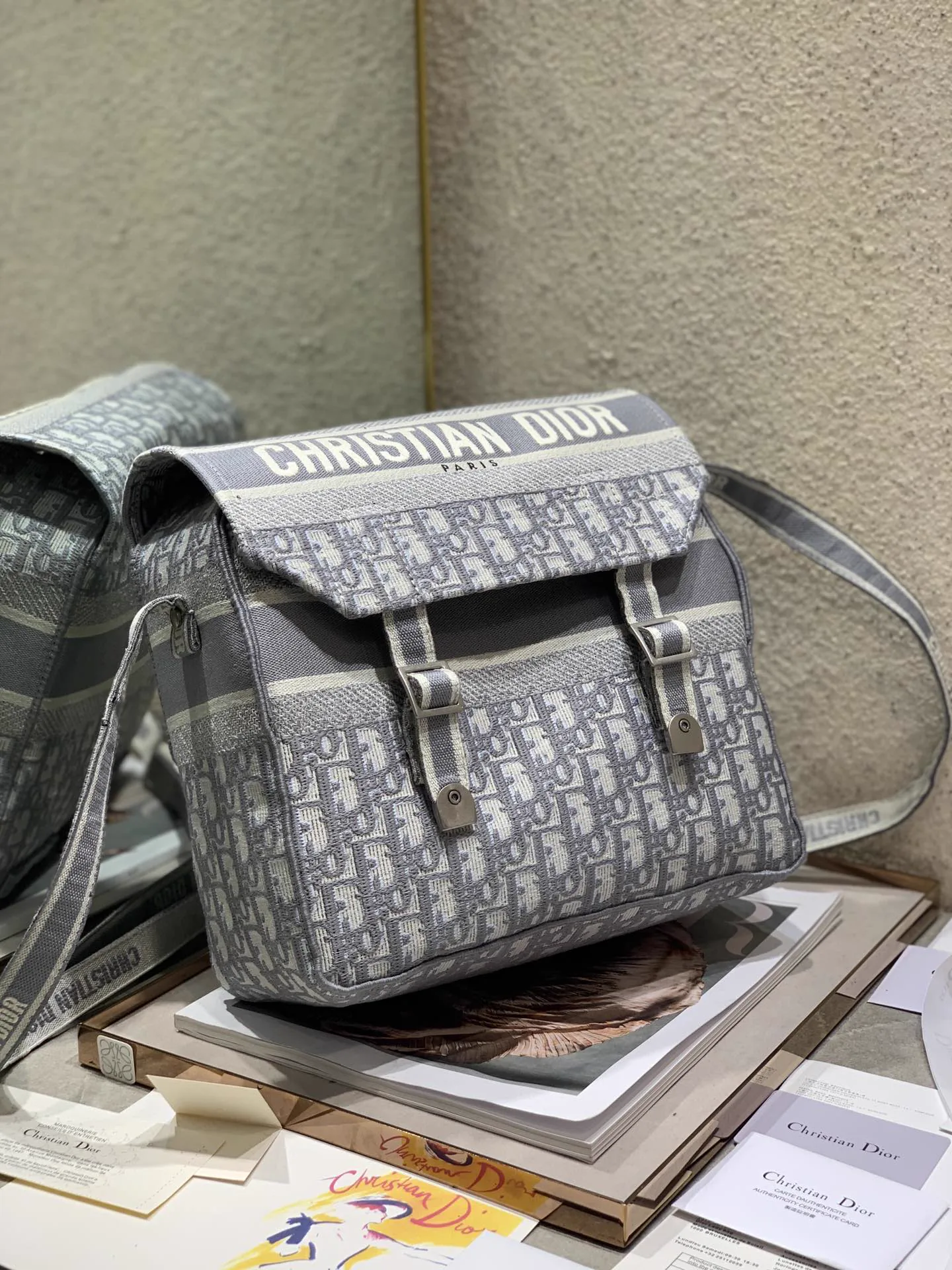 Reference image illustrating Replica Dior Oblique Camp Bag – A Detailed Guide to the Iconic Messenger Style