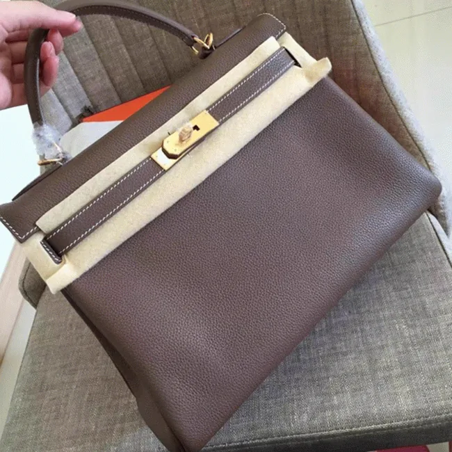 Replica Hermès Kelly Retourne 32cm Bag in Etoupe Clemence Leather – A Style Icon cover image