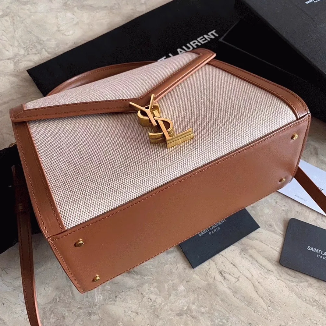 Reference image illustrating Replica Saint Laurent Cassandra Medium Bag in Beige Canvas – A Detailed Style Guide