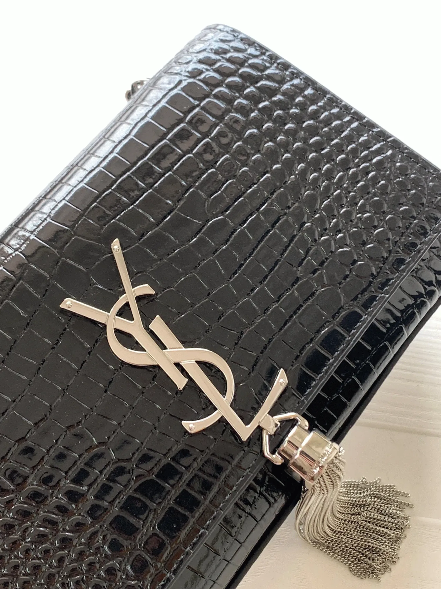 Reference image illustrating Replica Saint Laurent Kate Small Tassel Bag in Noir Crocodile-Embossed Leather