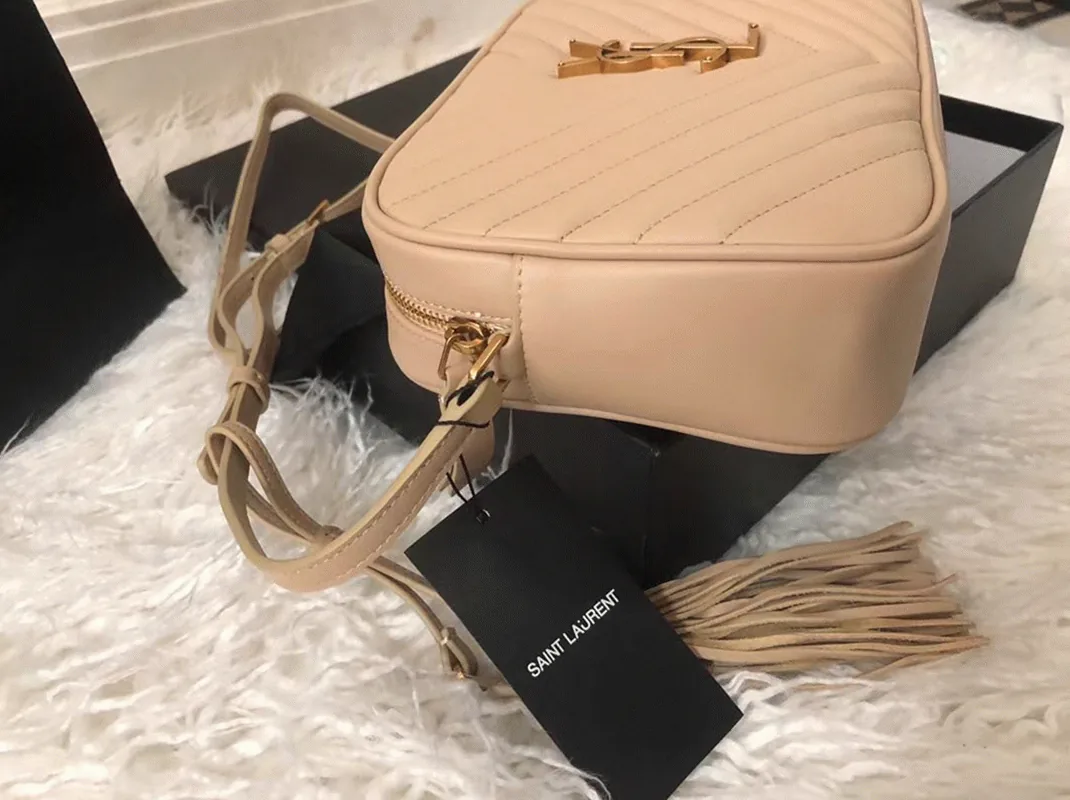 Reference image illustrating Replica Saint Laurent Lou Camera Bag in Beige – Detailed Style Guide