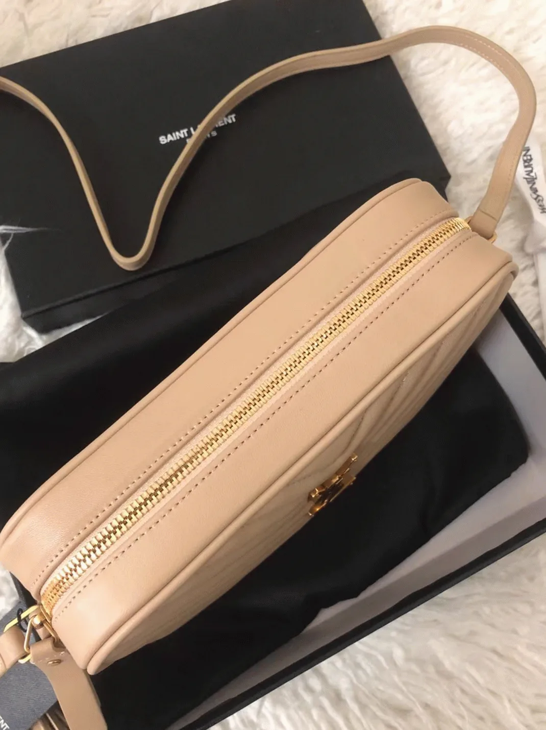 Reference image illustrating Replica Saint Laurent Lou Camera Bag in Beige – Detailed Style Guide
