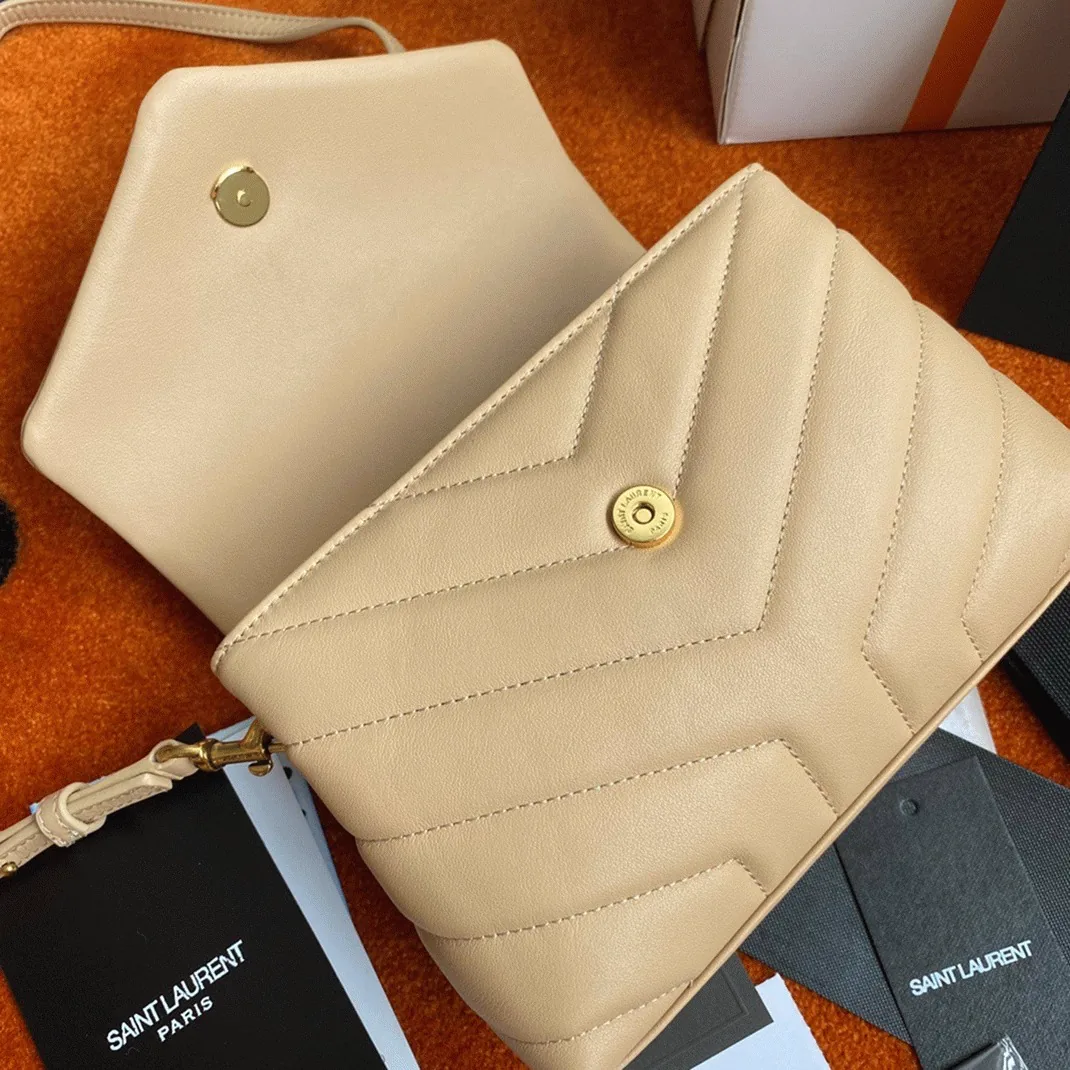 Reference image illustrating Replica Saint Laurent LouLou Toy Strap Bag in Beige – Design, History & Styling Guide