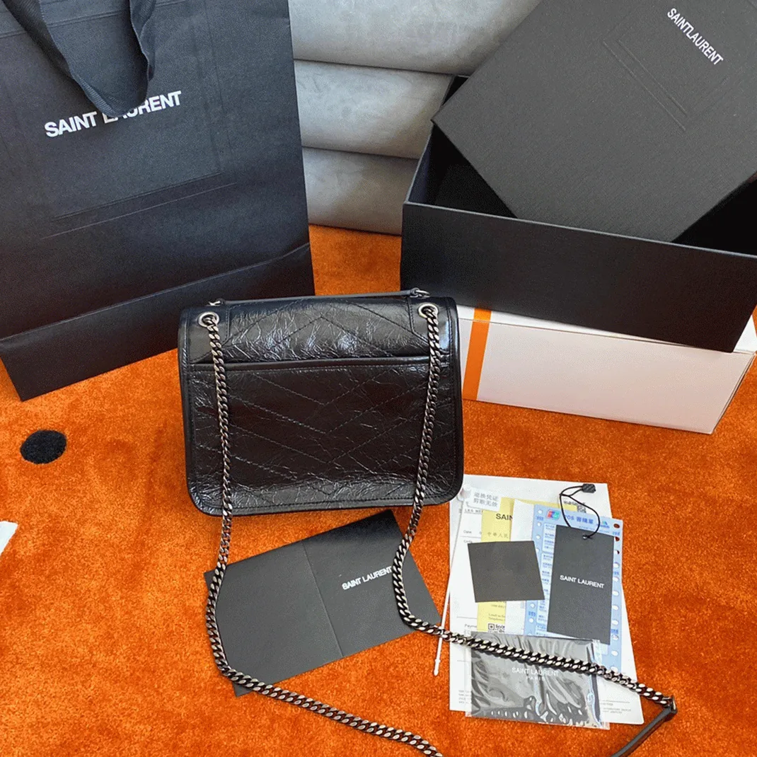 Reference image illustrating Replica Saint Laurent Niki Baby Chain Bag in Noir – A Detailed Style Guide