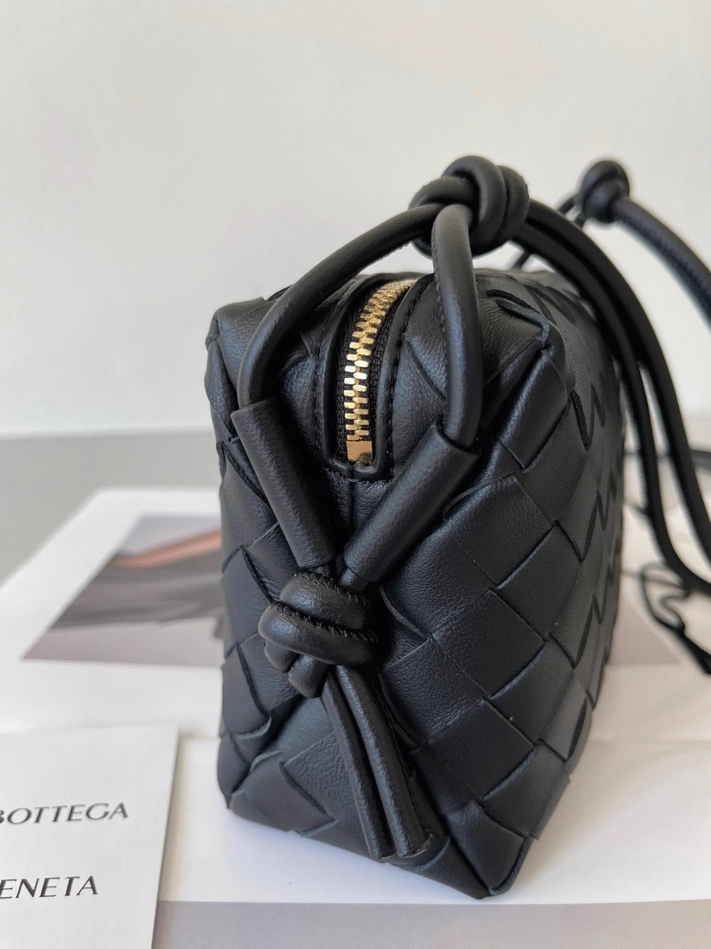 Reference image illustrating Replica Bottega Veneta Loop Mini Bag in Black – Design, History & Styling Guide