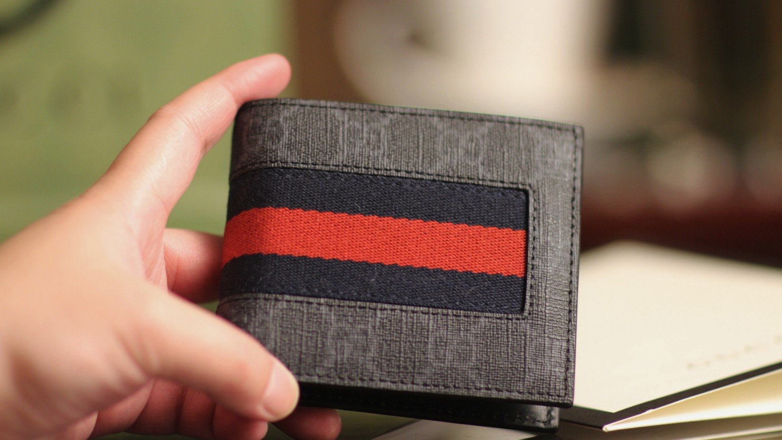 Reference image illustrating Replica Gucci GG Supreme Web Wallet – Iconic Canvas Bifold Design
