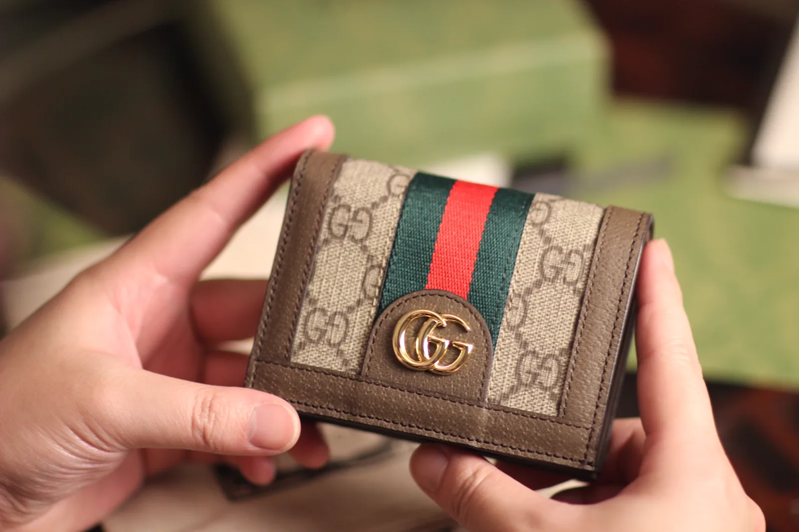 Reference image illustrating Replica Gucci Signature Wallet – Classic GG Canvas Bifold Design