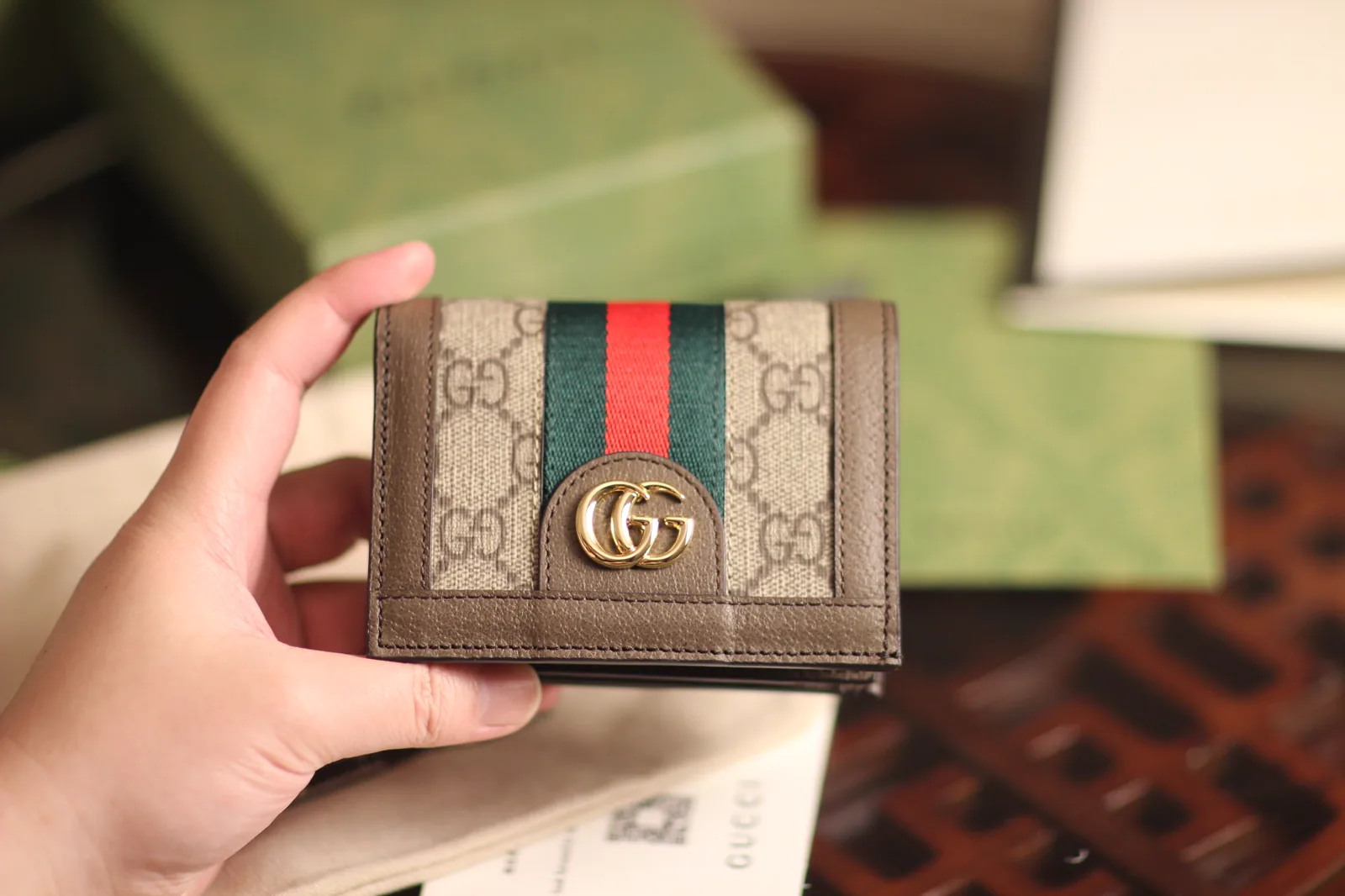 Reference image illustrating Replica Gucci Signature Wallet – Classic GG Canvas Bifold Design