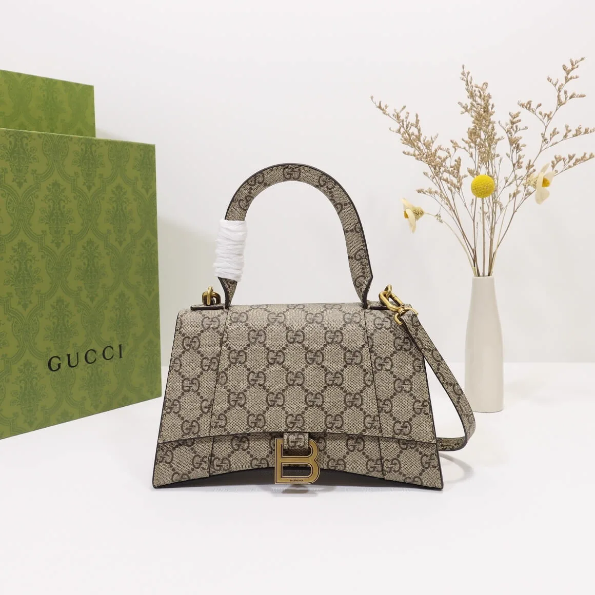 Reference image illustrating Replica Gucci x Balenciaga Small Hourglass Bag – The Houndstooth Collaboration Icon