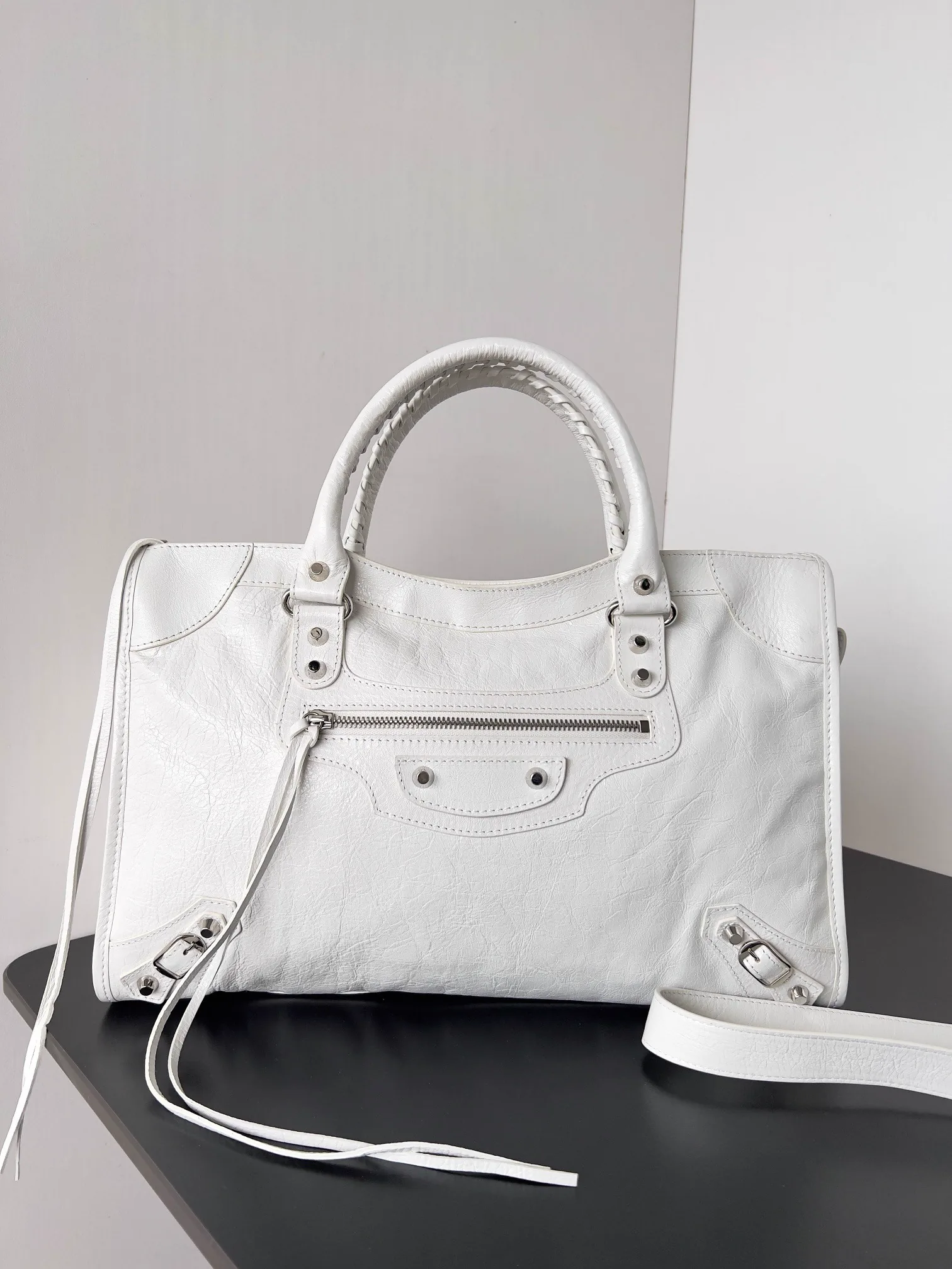 Reference image illustrating Replica Balenciaga Le City Medium Bag in White Arena Lambskin – A Detailed Style Guide