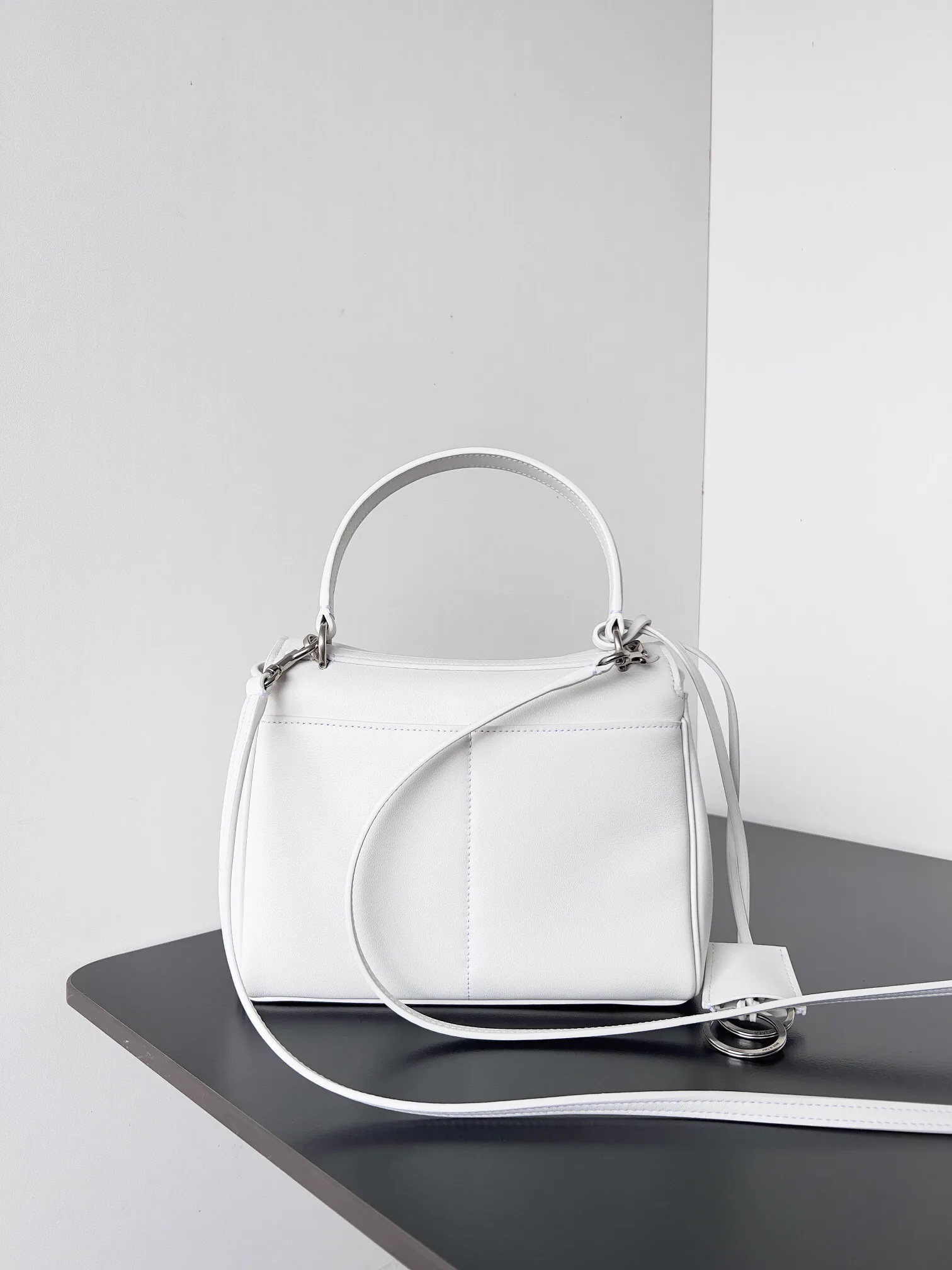 Reference image illustrating Replica Balenciaga Rodeo Mini Bag in White Calfskin – A Detailed Style Guide