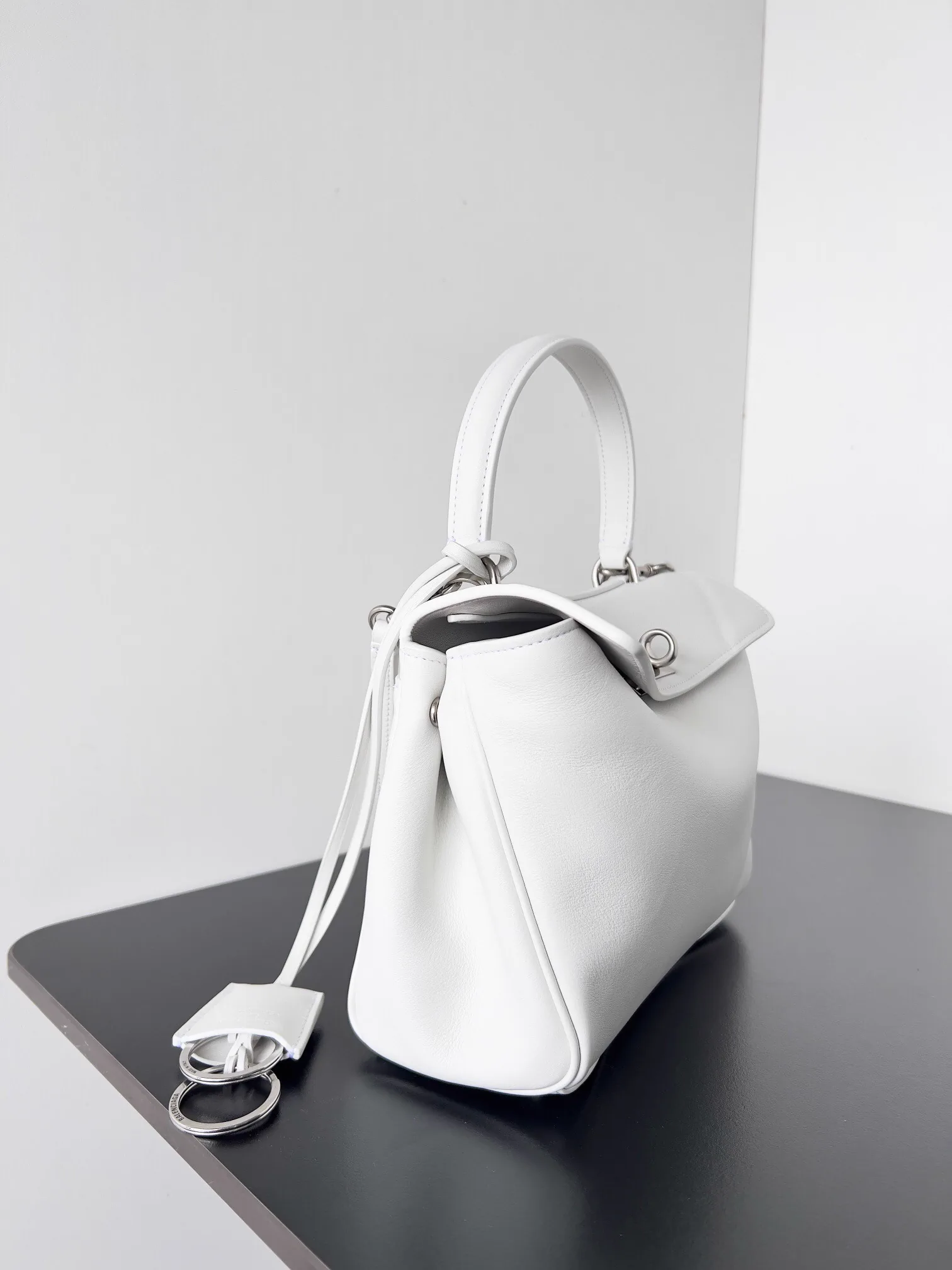 Reference image illustrating Replica Balenciaga Rodeo Mini Bag in White Calfskin – A Detailed Style Guide