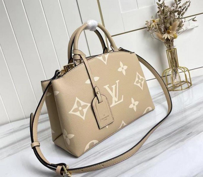 Reference image illustrating Replica Louis Vuitton Bicolor Monogram Empreinte Petit Palais Handbag in Tourterelle Gray and Cream