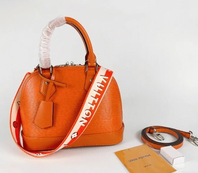 Replica Louis Vuitton Epi Leather Alma BB Handbag in Orange with Jacquard Strap cover image