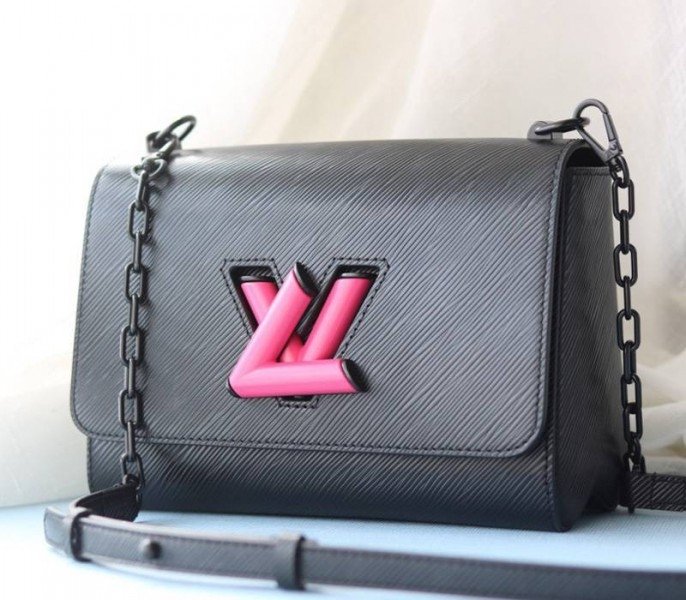 Reference image illustrating Replica Louis Vuitton Epi Leather Twist MM Bag Black Vibrant Pink Twist Lock