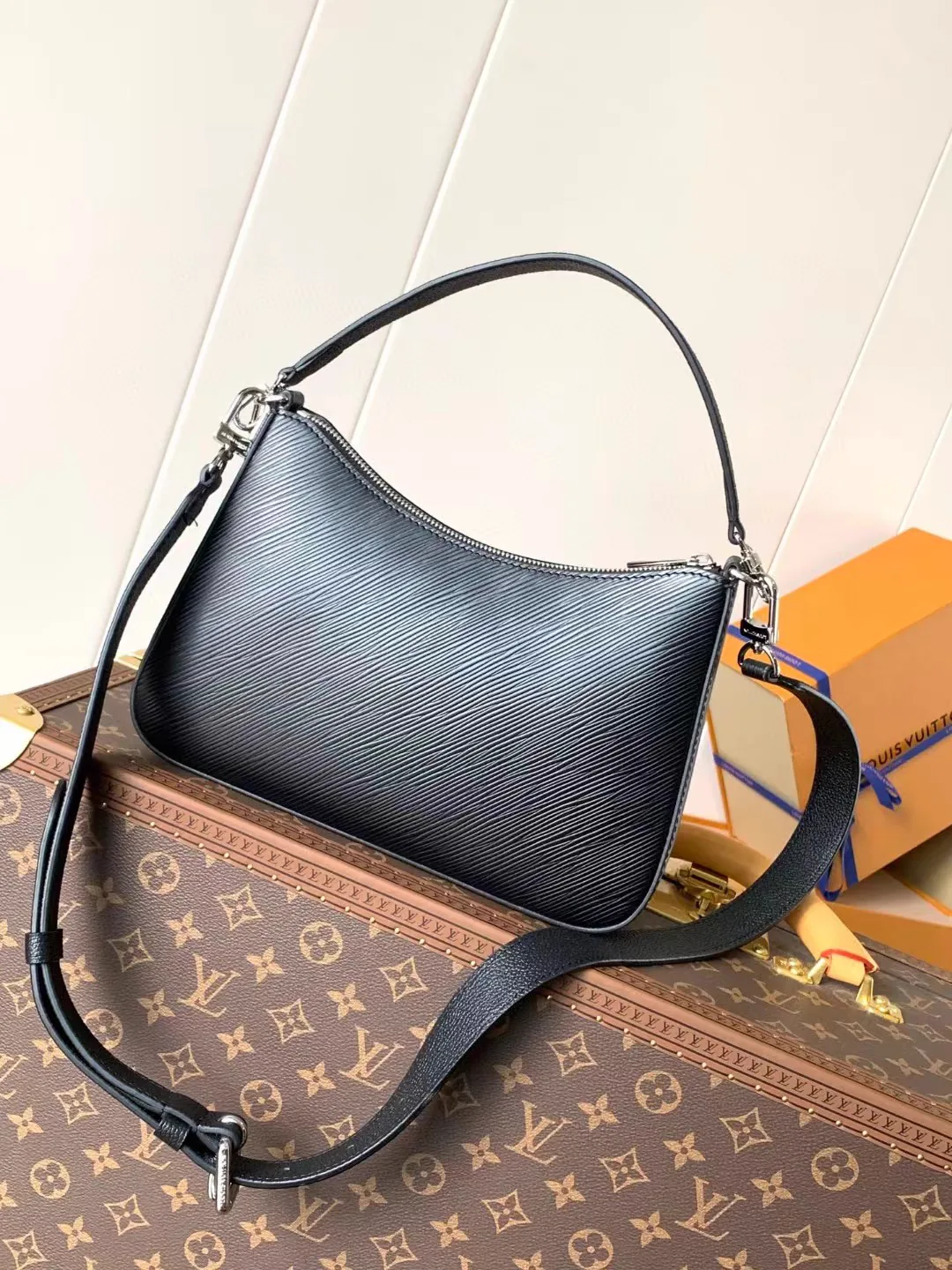 Reference image illustrating Replica Louis Vuitton Marelle Black Epi Leather Crossbody Bag – Detailed Style Guide