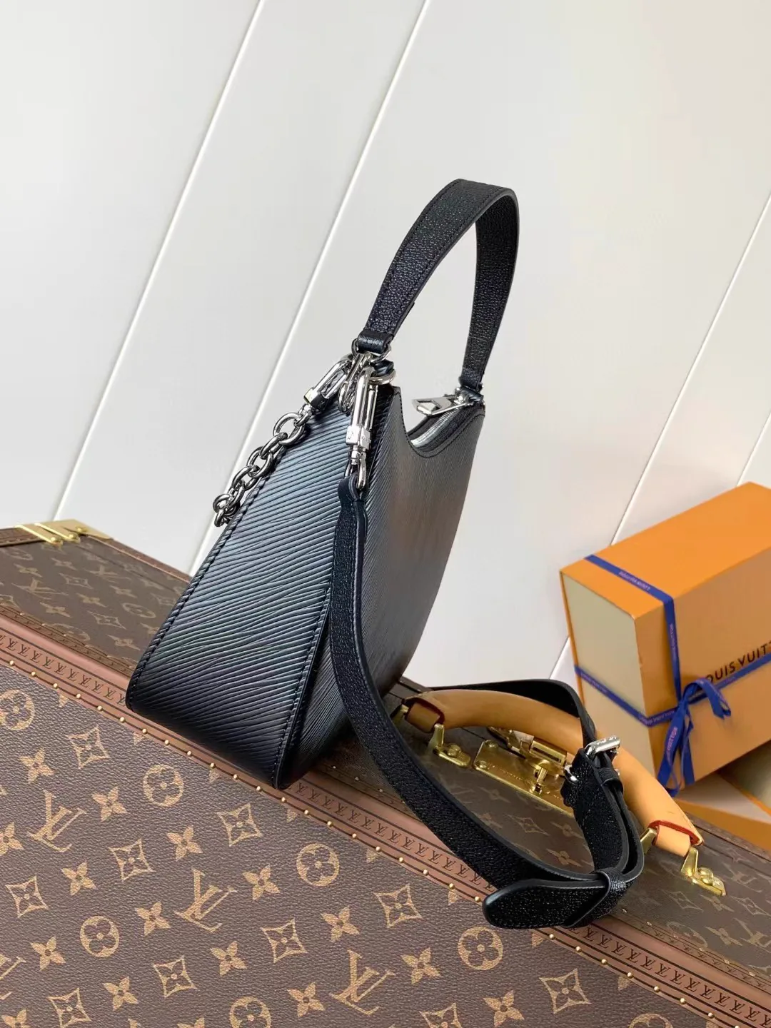 Reference image illustrating Replica Louis Vuitton Marelle Black Epi Leather Crossbody Bag – Detailed Style Guide