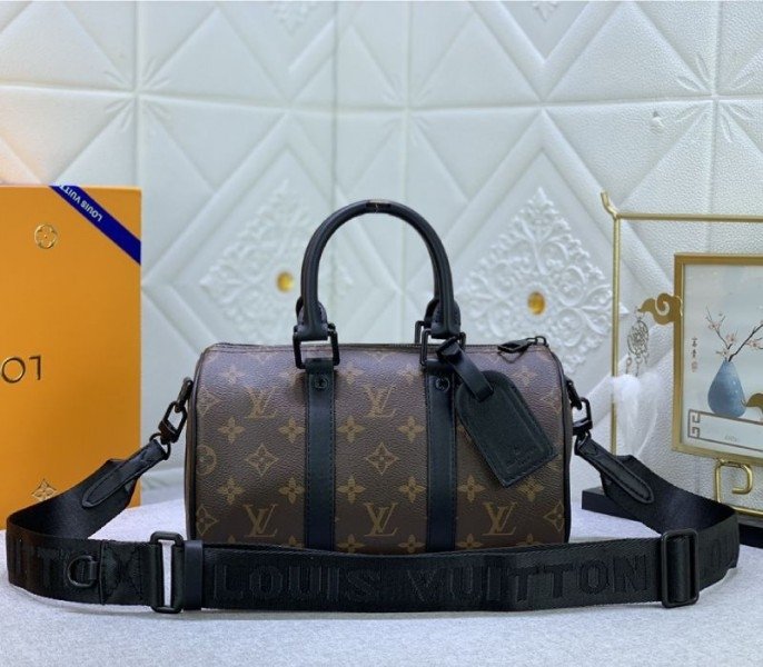 Replica Louis Vuitton Monogram Canvas Keepall Bandouliere 25 in Black – A Compact Travel Icon cover image