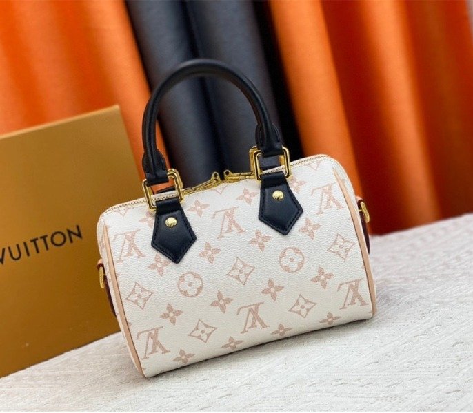 Reference image illustrating Replica Louis Vuitton Monogram Dune Canvas Speedy 20 Handbag With Jacquard Strap