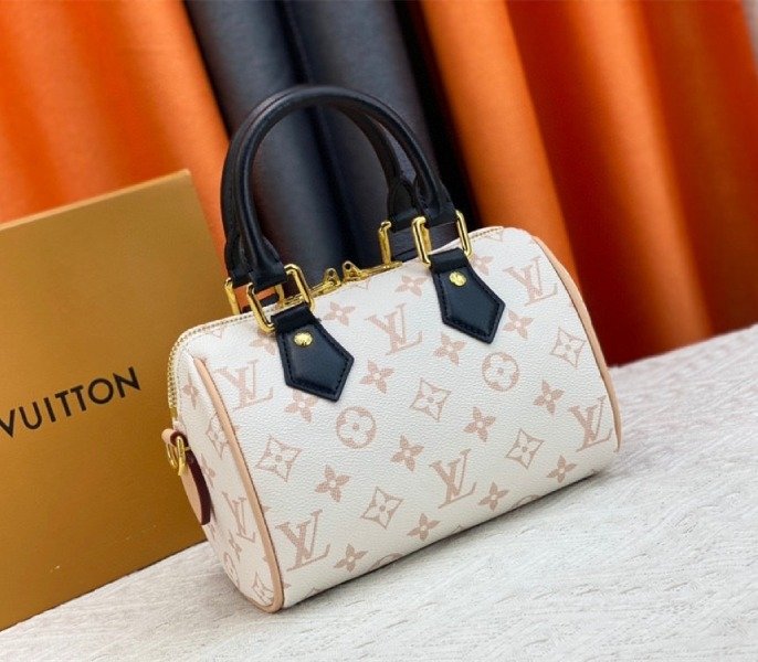 Reference image illustrating Replica Louis Vuitton Monogram Dune Canvas Speedy 20 Handbag With Jacquard Strap
