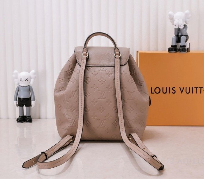 Reference image illustrating Replica Louis Vuitton Monogram Empreinte Montsouris PM Backpack in Tourterelle Gray