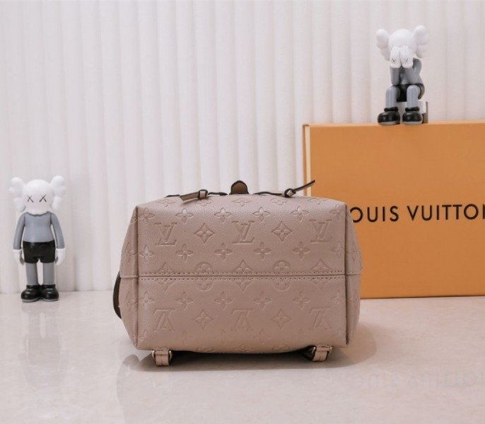 Reference image illustrating Replica Louis Vuitton Monogram Empreinte Montsouris PM Backpack in Tourterelle Gray
