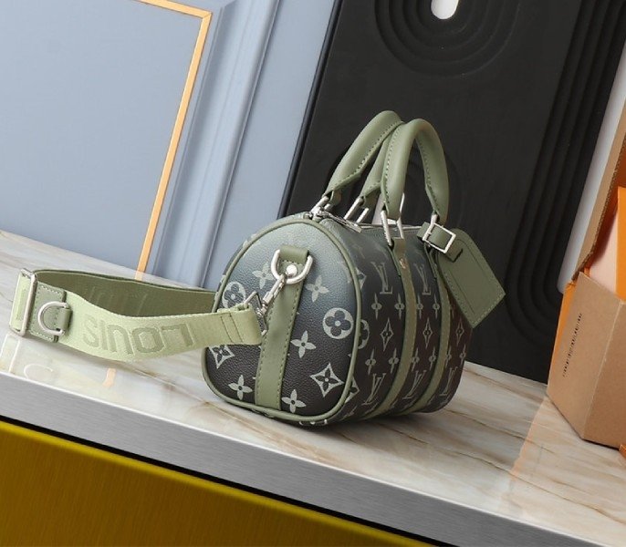Reference image illustrating Replica Louis Vuitton Monogram Gradient Canvas Keepall Bandouliere 25 City Bag in Khaki Green