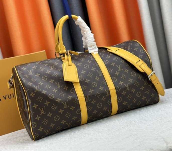 Reference image illustrating Replica Louis Vuitton Monogram Macassar Canvas Keepall Bandouliere 50 in Safran Yellow