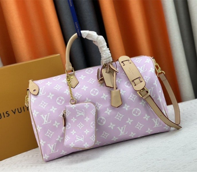Replica Louis Vuitton Speedy P9 Bandouliere 40 Bag in Hot Pink – Design, History & Styling Guide thumbnail
