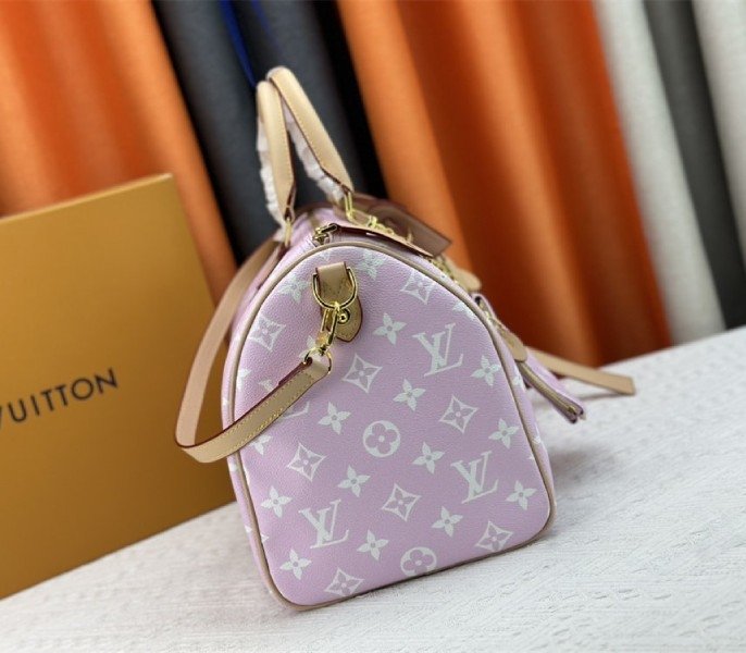 Reference image illustrating Replica Louis Vuitton Speedy P9 Bandouliere 40 Bag in Hot Pink – Design, History & Styling Guide