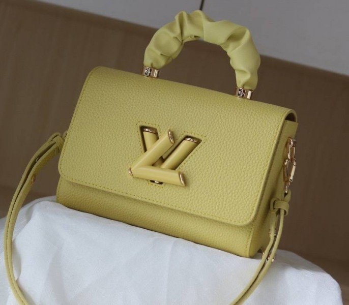 Replica Louis Vuitton Twist MM Scrunchie Handle in Ginger Yellow Taurillon Leather cover image
