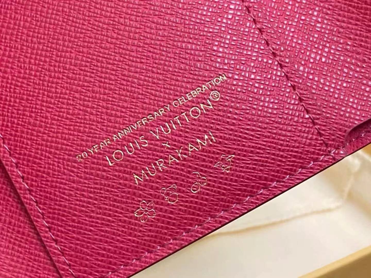 Reference image illustrating Replica Louis Vuitton x Takashi Murakami Victorine Wallet – Multicolor Monogram Compact Design