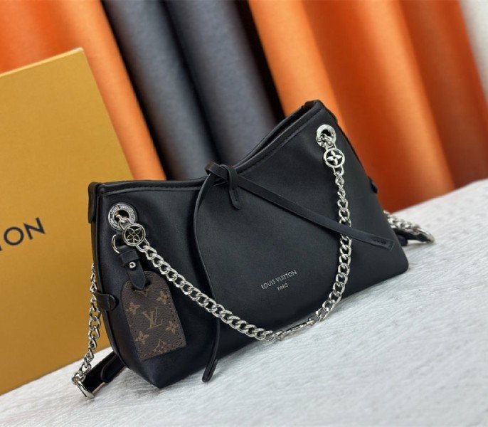 Reference image illustrating Replica Louis Vuitton x TM CarryAll Vibe BB in Black – A Detailed Style Guide