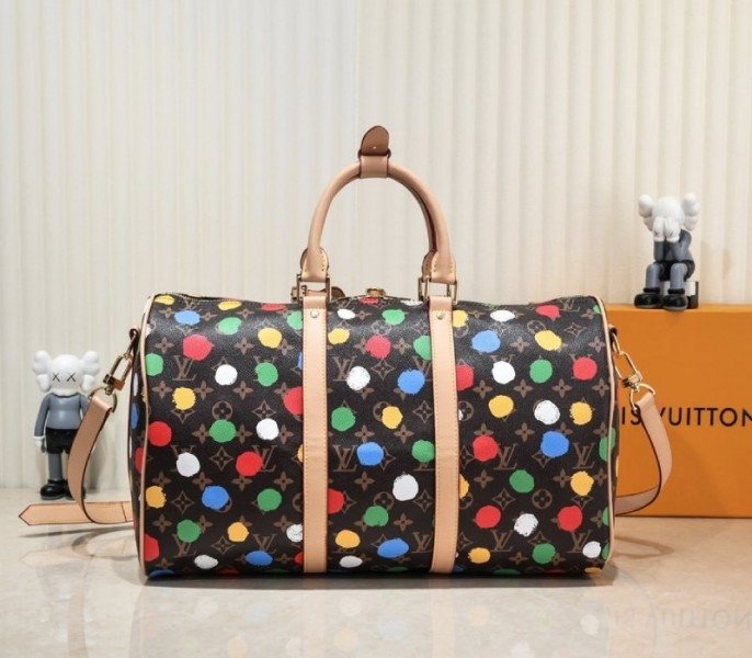 Reference image illustrating Replica Louis Vuitton X Yayoi Kusama Monogram Canvas Keepall Bandoulière 45 Travel Bag