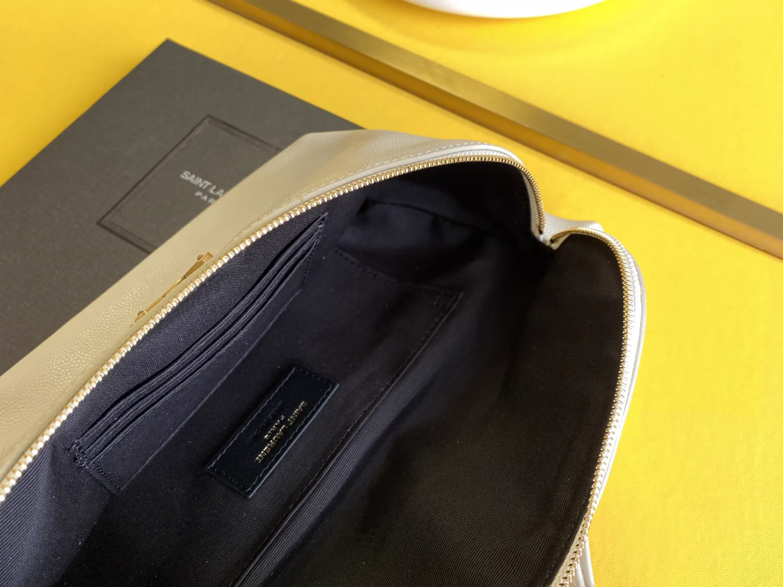 Reference image illustrating Replica YSL Classic Monogram Belt Bag in Grain Embossed Leather – Style Guide & History