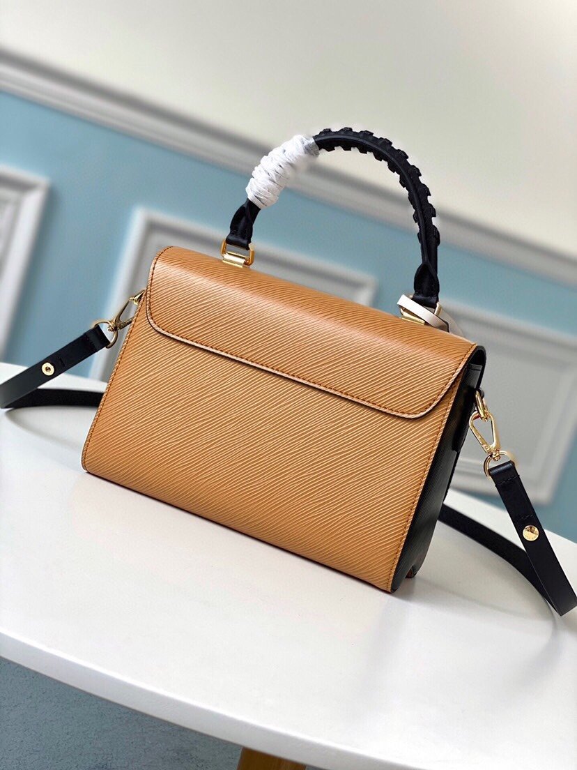 Reference image illustrating Replica LV Crafty Twist Mini Handbag: A Detailed Style Guide