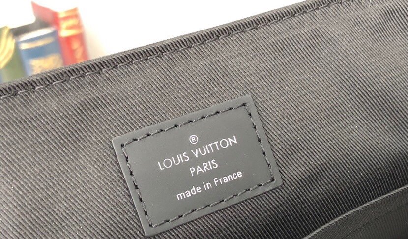 Reference image illustrating Replica LV New District PM Bag: A Detailed Look at the Design and Style Inspired by Louis Vuitton