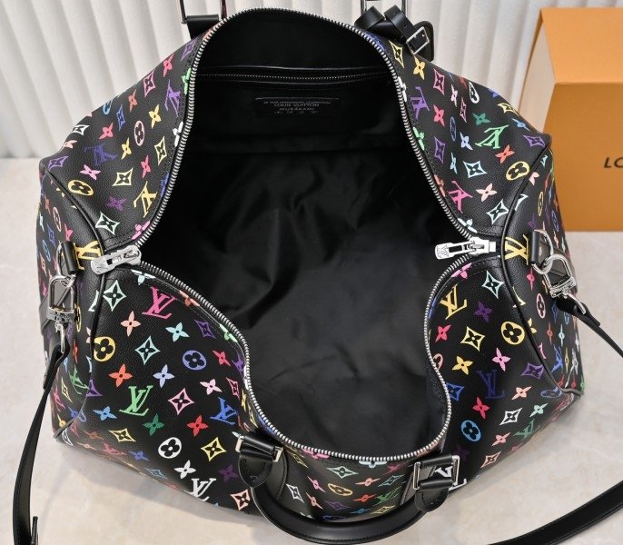 Reference image illustrating Replica LV X TM Multicolored Keepall Bandouliere 50 in Black – Iconic Louis Vuitton x Takashi Murakami Travel Bag