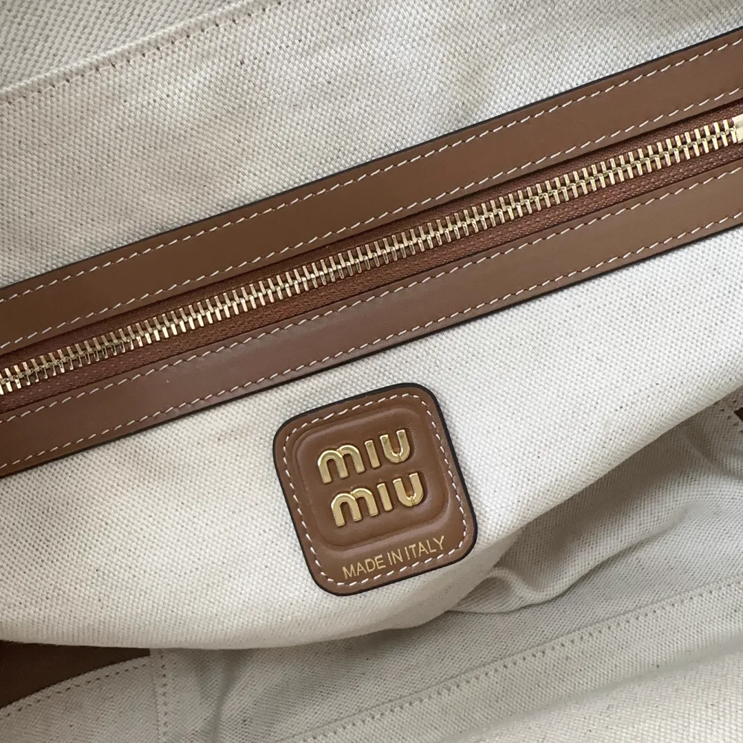 Reference image illustrating Replica Miu Miu 24 Handbag: Design, History, and Styling Guide