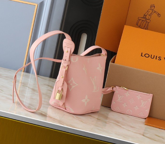 Reference image illustrating Replica Louis Vuitton Monogram Empreinte All In BB in Pink – Design & Style Guide