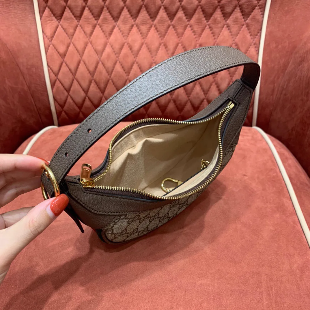 Reference image illustrating Replica Gucci Ophidia Mini Bag – Iconic GG Supreme Crossbody Design