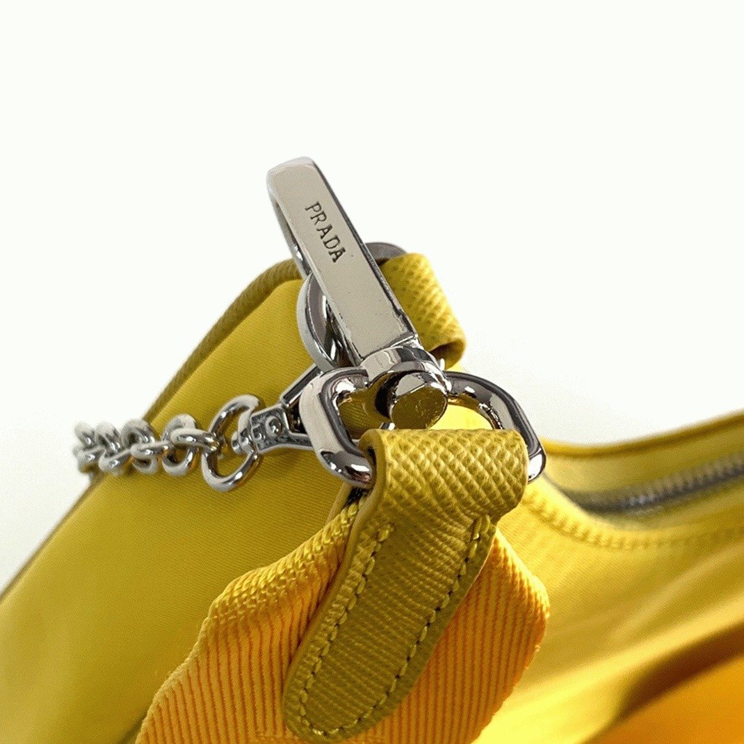 Reference image illustrating Replica Prada Re-Edition 2005 Nylon Shoulder Bag in Yellow (Likely Model)
