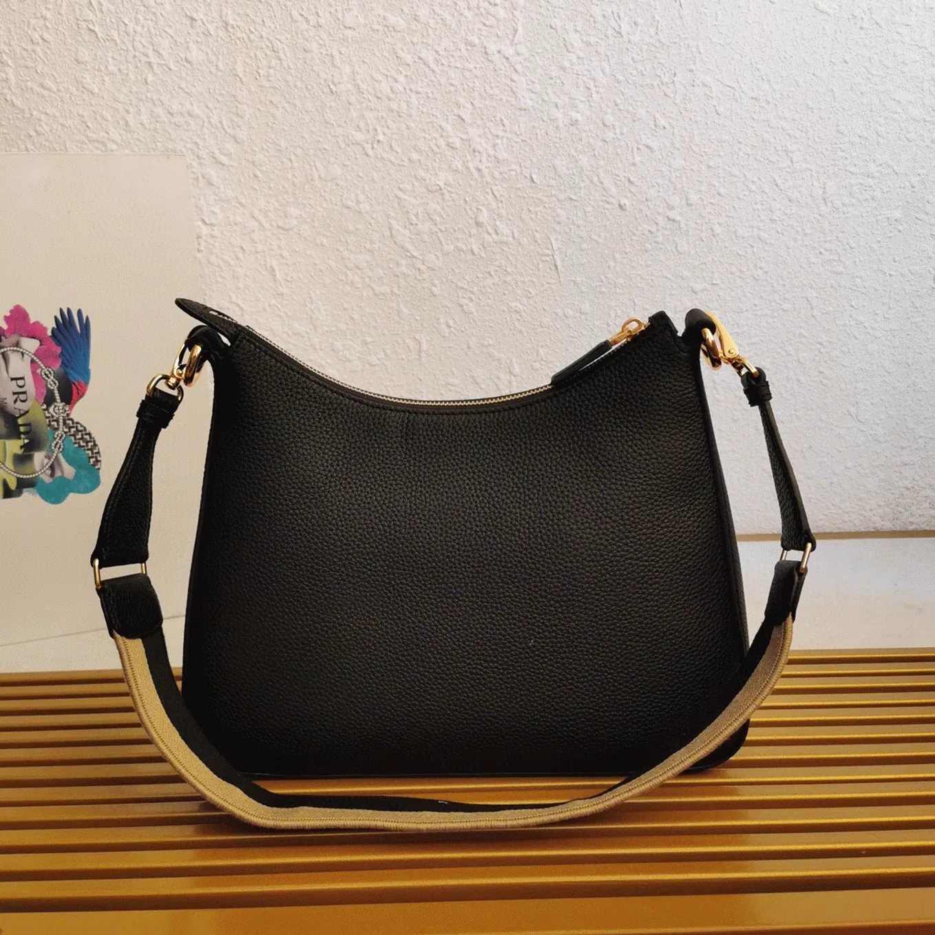 Reference image illustrating Replica Prada Re-Edition 2005 Shoulder Bag in Black Saffiano Leather